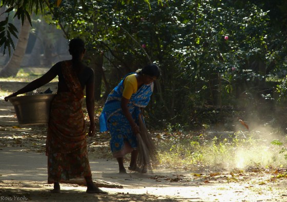 colourful local ladies keeping the place clean...