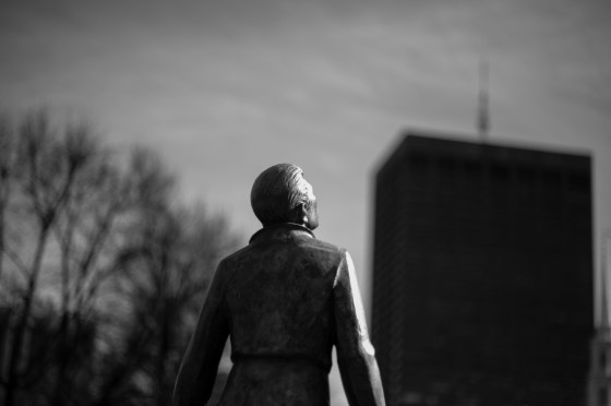statue looking up at..