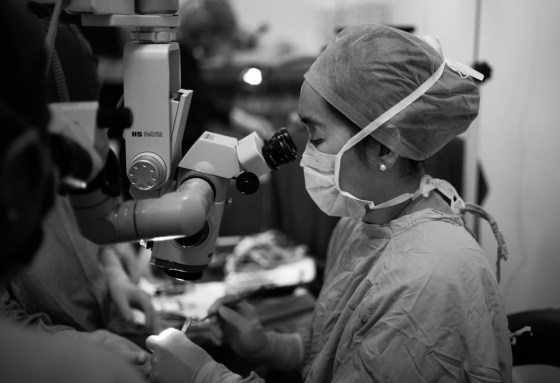 Dr N Tan at work with manual small incision cataract surgery