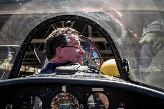 Warren sat in front of course...