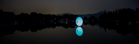 and as the light faded, a giant round screen appeared introducing the show