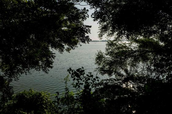 a huge lake fringed by an elevated path...